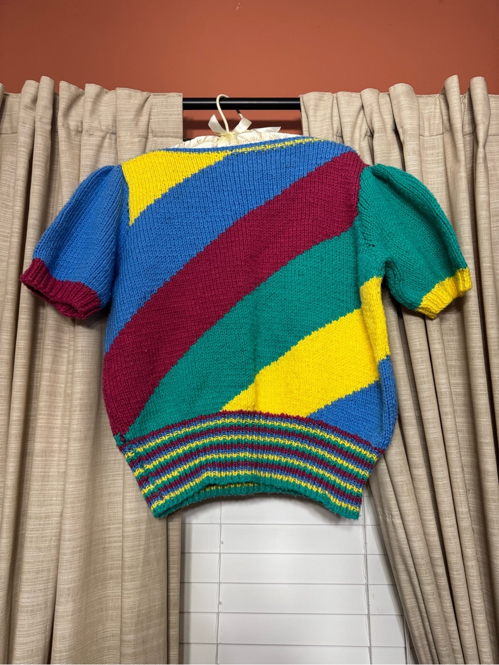 Bold Diagonal Stripe Off-the-Shoulder Sweater in Blue/Green/Yellow/Maroon